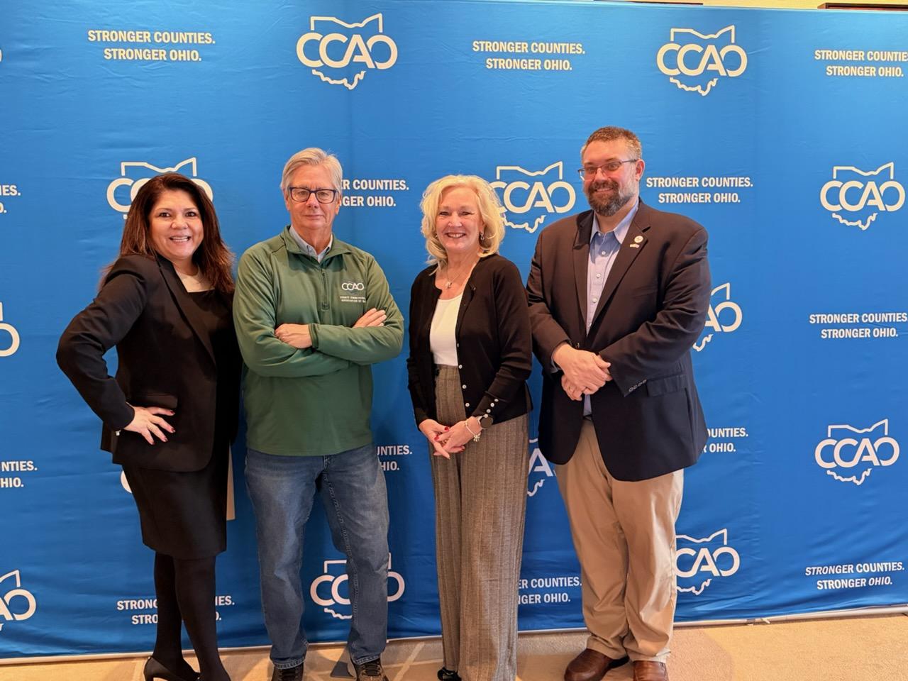Lucas County Commissioners Anita Lopez, Pete Gerken, and Lisa Sobecki and Engineer Mike Pniewski.